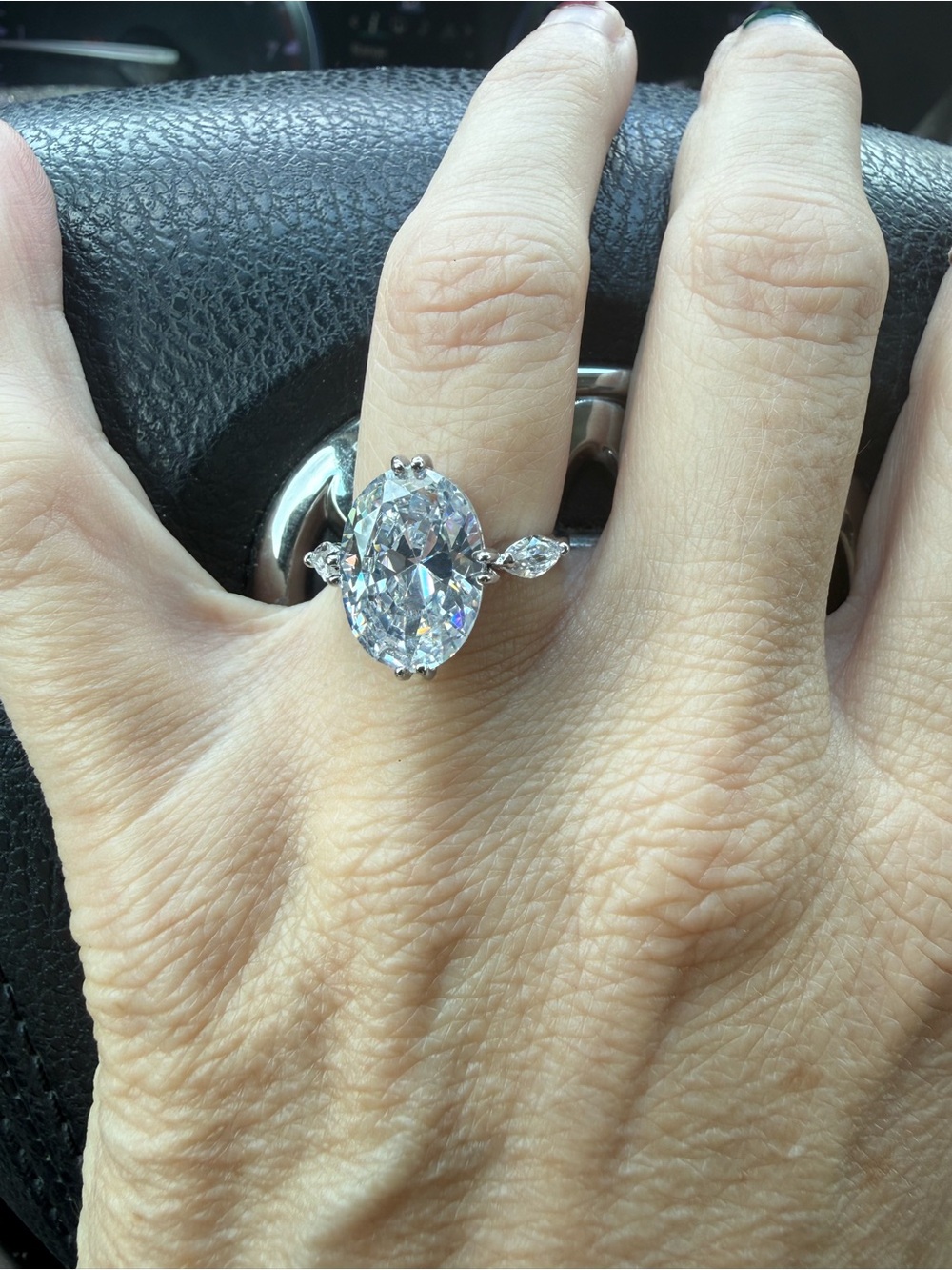 Elegant 8 carat Oval AAA CZ center with two Marquis on the sides